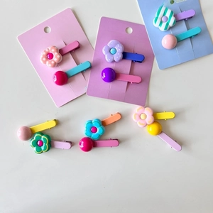 Colorful floral and beaded hair clips set for girls in various pastel plastic designs