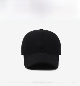 Front view of black wool-blend baseball cap featuring silver metal shield logo detail