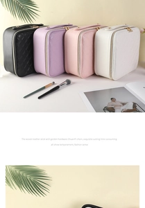 Quilted leather vanity cases in black, purple, pink and white with gold double zippers