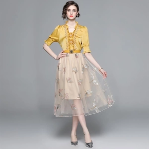 Elegant French style two-piece set with yellow chiffon top and butterfly embroidered mesh skirt