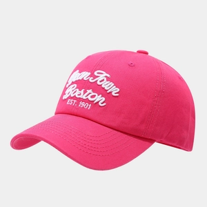 Detail of white Jean Town Boston embroidery on a vibrant fuchsia cotton baseball cap