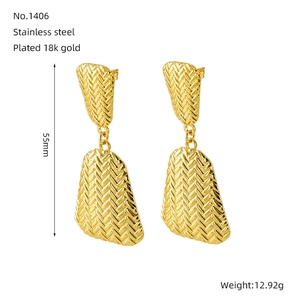 Detail of 55mm braided texture gold earrings showing dimensions and 12.92g weight specs