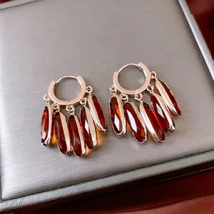 Vintage style rose gold leverback earrings with amber glass oval fringe dangles