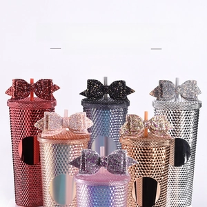 Close-up of glitter bow-knot straw charms in various colors for studded 24oz tumblers