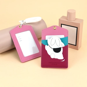 Cartoon panda and rabbit PU leather card holders with retractable keychains on soft background