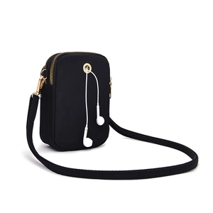 Lightweight black nylon mini crossbody phone bag for women with built-in earphone hole
