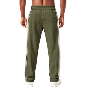 Rear view of loose fit army green corduroy pants with white and black side stripes