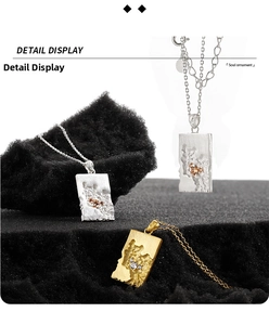 Detailed close-up of rectangular lava textured pendant necklaces with cubic zirconia accents