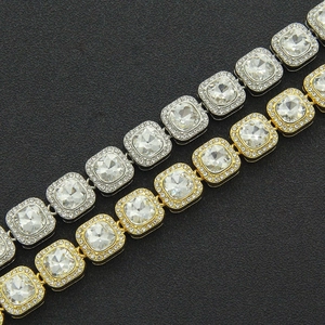 Macro shot of gold and silver plated hip hop tennis bracelets with iced out square diamonds