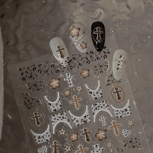 Detailed 5D nail art stickers featuring gothic cross, leopard print and star designs