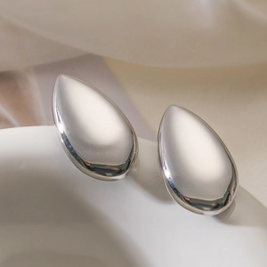 Polished silver teardrop stud earrings in a minimalist geometric design for women