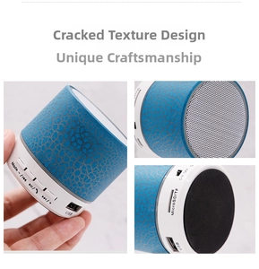 Detail view of blue crackle texture bluetooth speaker with USB and TF card ports