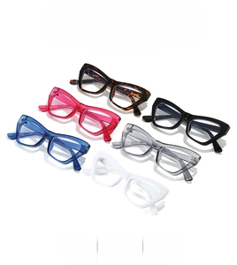 Detailed collection of vintage cat-eye eyewear frames in six assorted colors on white