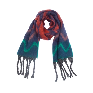Detailed view of colorful wavy jacquard pattern scarf with soft thick black fringe trim
