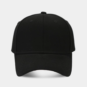 Close-up of the six-panel stitching and embroidered eyelets on the black cotton baseball cap