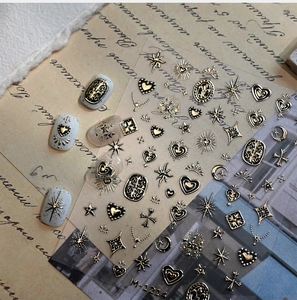Detailed view of M-1214 gold and black 3D embossed nail stickers with vintage patterns