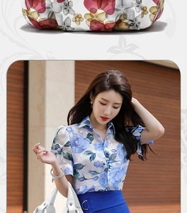 Fashionable floral tote bag paired with a blue skirt and white handbag on a stylish model
