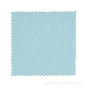 Polished light blue microfiber jewelry cleaning cloth with scalloped edges for rings