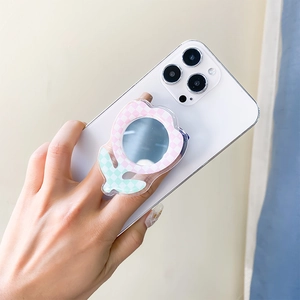Detail of pink and green checkerboard flower phone grip with built-in makeup mirror