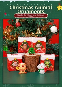 Close-up of resin Christmas animal figurines including reindeer and snowman decorations