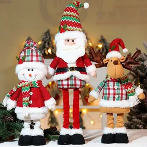 Detail of Christmas telescopic figurines featuring knitted textures and plush fabrics