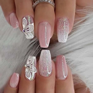Pink gradient long coffin press-on nails with butterfly bows and glitter accents