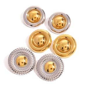 Three pairs of vintage stainless steel twisted earrings in gold and silver finish