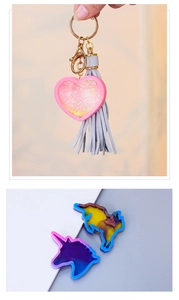 Detail of DIY epoxy resin unicorn mold and heart-shaped keychain with tassel charm