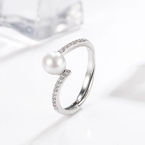 Elegant S925 silver open ring featuring a round white pearl and sparkling zircon accents