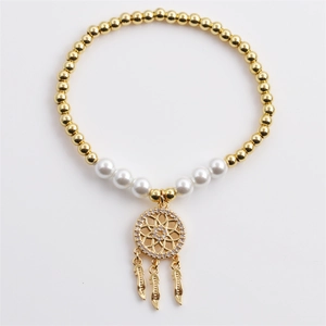Gold-plated dreamcatcher charm bracelet with white pearls and hanging feather pendants