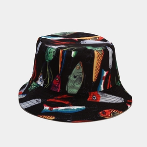 Detail of a black bucket hat featuring colorful fishing bait and sea animal patterns