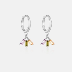Detail of 925 sterling silver hoop earrings featuring three colored rectangular zircons
