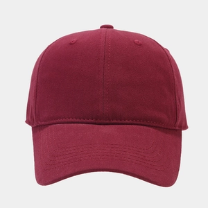Detail of dark red cotton baseball cap with six-panel construction and eyelets