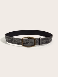 Close-up of vintage black PU leather belt with an embossed pattern and bronze metal buckle