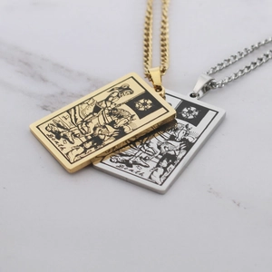 Close-up of tarot death card rectangular pendants in gold and silver stainless steel