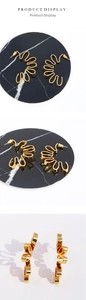 Abstract golden petal stud earrings with artistic curved metal design in three views