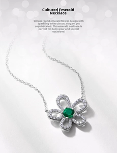 Detailed close-up of a flower-shaped emerald pendant with white zircon and S925 silver chain