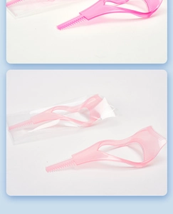 Detail view of pink plastic eyelash guards for makeup beginners in packaging