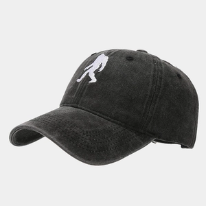 Detailed close-up of Sasquatch embroidery on vintage washed cotton baseball cap