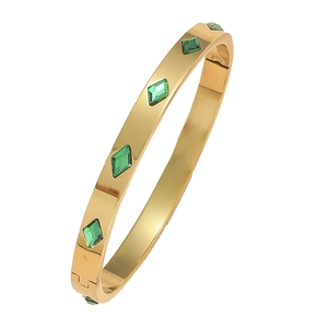 Minimalist gold stainless steel bracelet featuring an elegant green rhombus gemstone