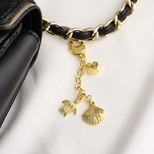Goldener Seestern Anhänger mit Kristallen an geflochtener Leder-Taschenkette