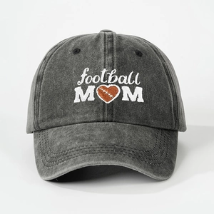 Close-up of white Football Mom embroidery on a dark grey washed cotton baseball cap