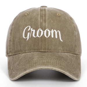 Detail of Groom embroidery on washed cotton vintage baseball cap in tan color