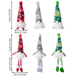 Christmas gnomes set with knitted hats in red, gray and green for festive decoration