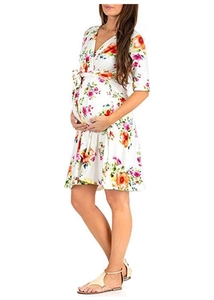 Side view of white maternity dress with floral print and high waist tie belt