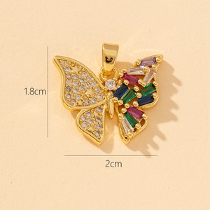 Detailed view of a 1.8x2cm golden butterfly pendant with colorful zircon stones