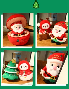 Detail view of plush Christmas toys including Santa and elk in soft holiday theme fabric