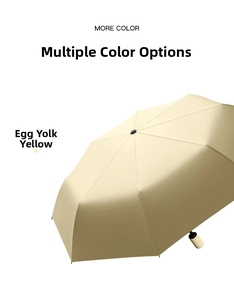 Custard yellow automatic folding umbrella shown from a 45-degree angle in open view