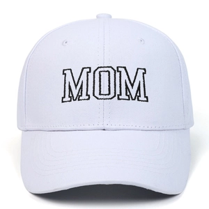 Detailed close-up of black MOM embroidery on a white cotton structured baseball cap