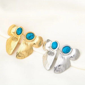 Minimalist geometric wing earrings in gold and silver with blue turquoise stones